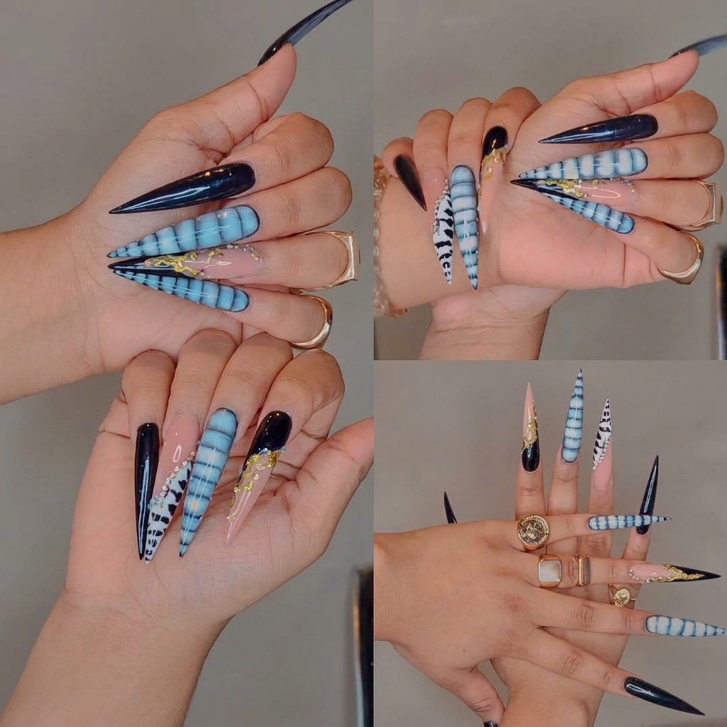 Blue and black stiletto nails with gold chrome detailing